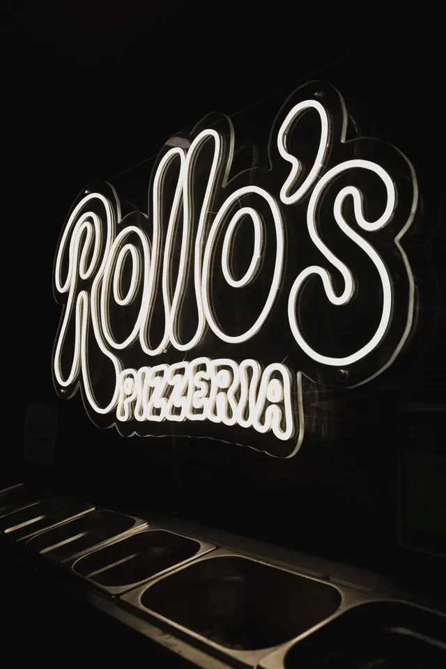 The Rollo's neon sign inside the horsebox